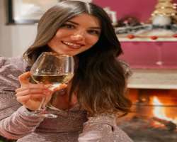 Adriana Spink consuming alcohol
